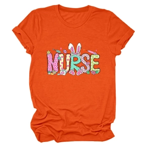 Detail of artistic Nurse text with Easter bunny ears and icons on orange t-shirt fabric