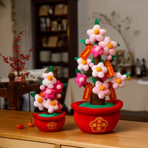 Detail of plush Chinese New Year orange tree decor with festive golden greetings