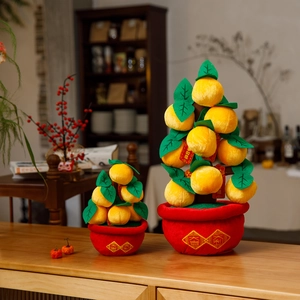 Detail of plush orange tree decor set with embroidery and lucky tags for New Year