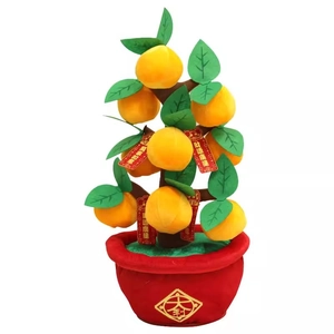 Chinese New Year lucky orange tree decoration with festive red tags and golden pot base