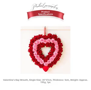 Macro shot of 35x37cm heart shaped rose wreath with red and pink artificial silk flowers