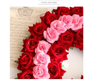 Close-up of velvet red and pink roses with green leaves for Valentine decoration