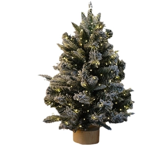 Mini sapin de Noël enneigé de table avec lumières LED et socle en bois naturel