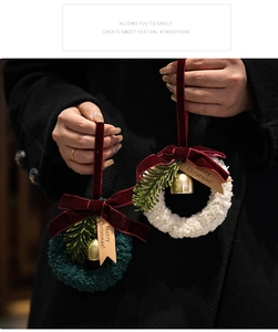 Handmade Christmas wreath pendants with red velvet bows and golden bells for tree decor