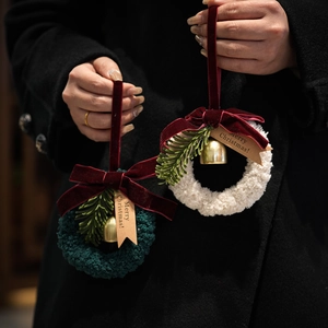 Plush Christmas wreath hanging ornaments with red velvet bow and golden bells