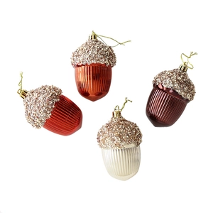 Set of four acorn-shaped Christmas ornaments with glittered caps and ribbed textures