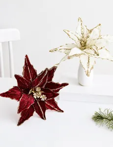 Close-up of 26CM red and cream velvet Christmas flowers with gold glitter accents