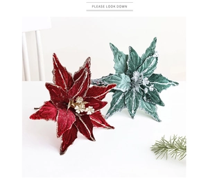 Close-up of 26cm red velvet artificial poinsettia with glitter petals for Christmas decor
