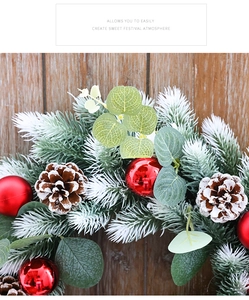 Close-up of 40cm Christmas wreath featuring red balls, pine cones, and eucalyptus leaves