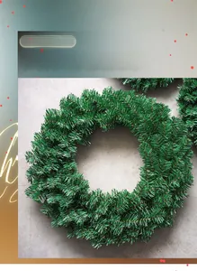 Close-up of artificial green Christmas wreath with lifelike pine needles for DIY decor