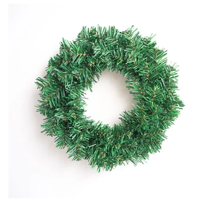 Detailed view of high-density green PVC pine needle Christmas wreath for DIY holiday decor