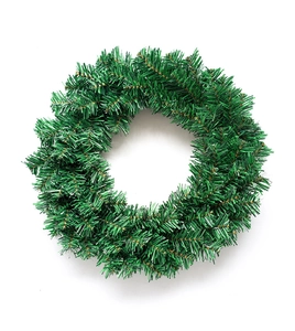 Detail of dark green artificial pine needle wreath for festive DIY Christmas decoration