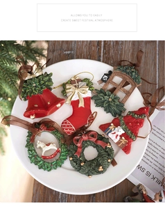 Detailed view of six vintage resin Christmas ornaments including trees and stockings