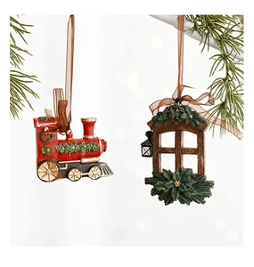 Close-up of vintage resin red train and rustic window Christmas tree hanging ornaments