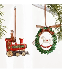 Detailed resin Christmas ornaments featuring a red vintage train and white rocking horse wreath