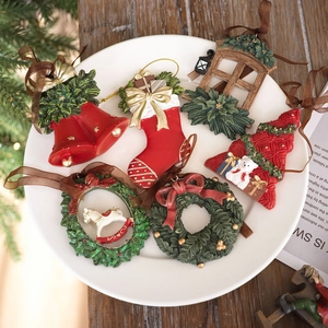 6-piece festive resin Christmas tree ornaments set with red bells, socks and miniature houses