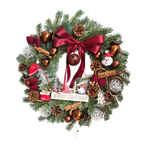 Burgundy Christmas wreath with Santa Claus doll, pine cones and Merry Christmas sign