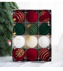 Set of 12 flocked Christmas balls in red, green, and white colors in a display box