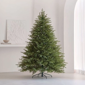 Lush green PE artificial Christmas tree with dense needles and metal stand for home decor
