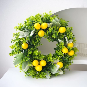 Artificial lemon wreath with green leaves and yellow fruit for summer home wall decor