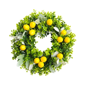 Artificial lemon wreath with vibrant yellow fruits and green leaves for home wall decor