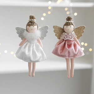 Detail of pink and white plush ballet girl angel ornaments with sequin wings on tree