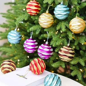 Christmas tree ornaments set with textured wave patterns and glitter stripes in mixed colors