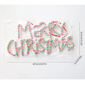 Detailed view of Merry Christmas sign decoration with red and green candy cane textures
