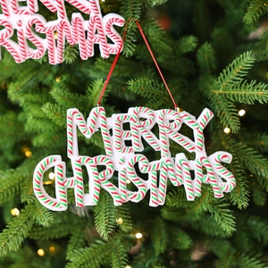 Merry Christmas lettering pendant with red green white spiral texture on a Christmas tree