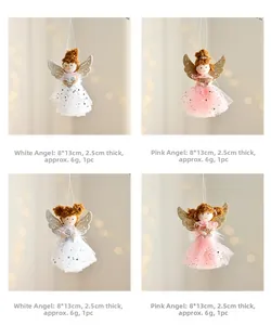 Detail of plush angel ornaments with sequined tulle dresses and gold glitter wings