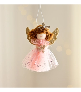 Detail of pink mesh dress angel doll with golden glitter wings and snowflake