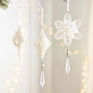 White Christmas ornaments set with glitter texture, pearl beads, and crystal drop pendants