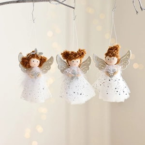 Three plush angel doll ornaments with mesh wings hanging for Christmas tree decorations