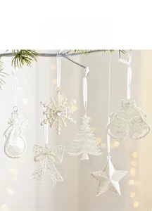 White glittery Christmas ornaments featuring snowman and snowflake shapes on ribbons