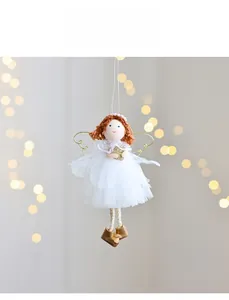 White mesh Christmas angel doll ornament with golden wings and knit hair detail