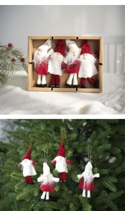 Détail de gnomes de Noël en feutre de laine avec barbe en peluche et chapeaux tricotés