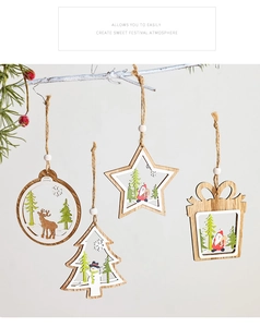 Close-up of four rustic wooden Christmas ornaments hanging on white branches