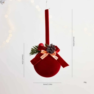 Détail de cloche de Noël en velours rouge avec nœud, pomme de pin et ruban de fête