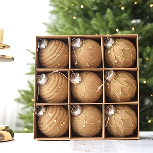 Set of 9 champagne gold flocked Christmas ball ornaments with glitter in a gift box