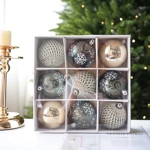 Set of 9 green and gold Christmas ball ornaments with snowflake patterns and textures