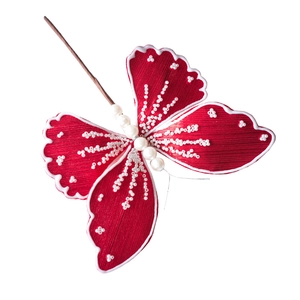 Red fabric butterfly Christmas tree decoration with white beads and pearl body on a stem