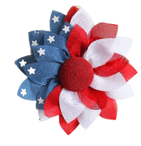 Macro shot of rustic burlap floral petals in red white and blue for patriotic decor