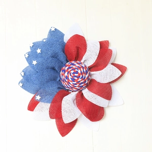 Detailed close-up of handmade red white and blue patriotic mesh wreath decoration