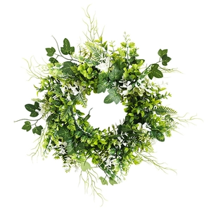 Lush artificial green tulip and fern leaf wreath with small white flowers for home decor