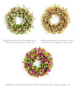 Close-up of 40cm spring wildflower wreaths in pink, purple, and yellow floral designs