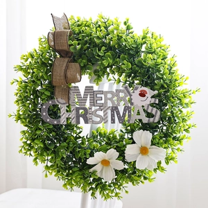 Eucalyptus wreath with Merry Christmas sign, burlap bow and white daisies decoration