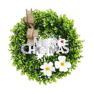Eucalyptus Merry Christmas wreath with burlap bow and daisies on white background