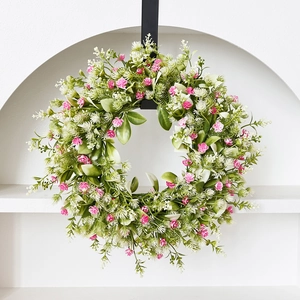 Spring artificial daisy wreath with green leaves and pink flowers for front door decor