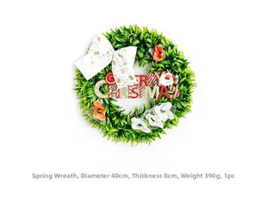 Detail of 40cm Christmas wreath with green leaves, polka dot bow and Merry Christmas sign