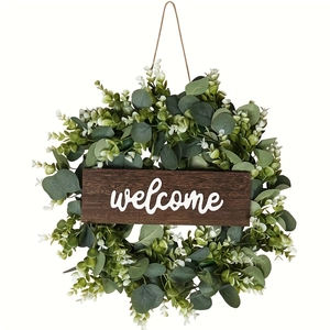 Spring eucalyptus wreath with a dark wood welcome sign for home front door decor